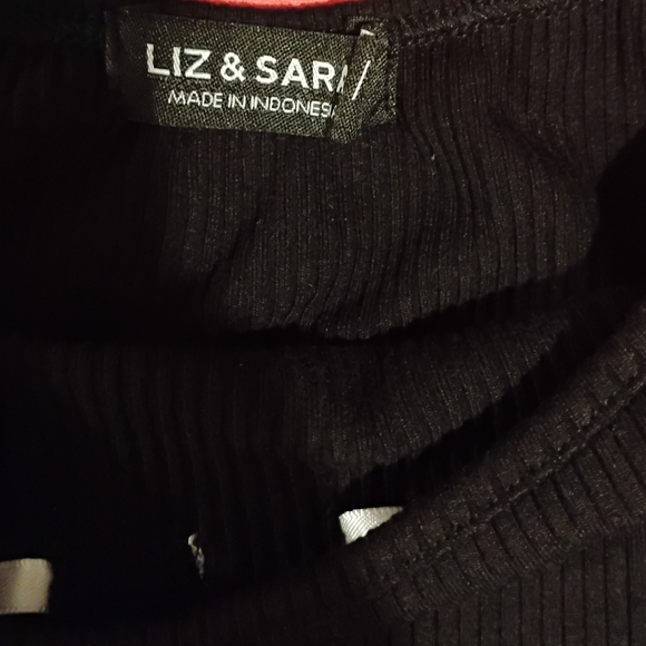 Liz And Sara Elegant Black Mini Dress with White Bow And Stitching Accents. - Picture 9 of 11